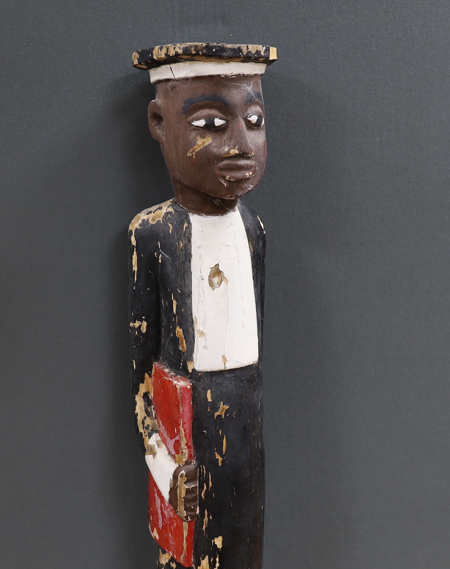 A colonial carved and painted wood novelty figure, 150cm high